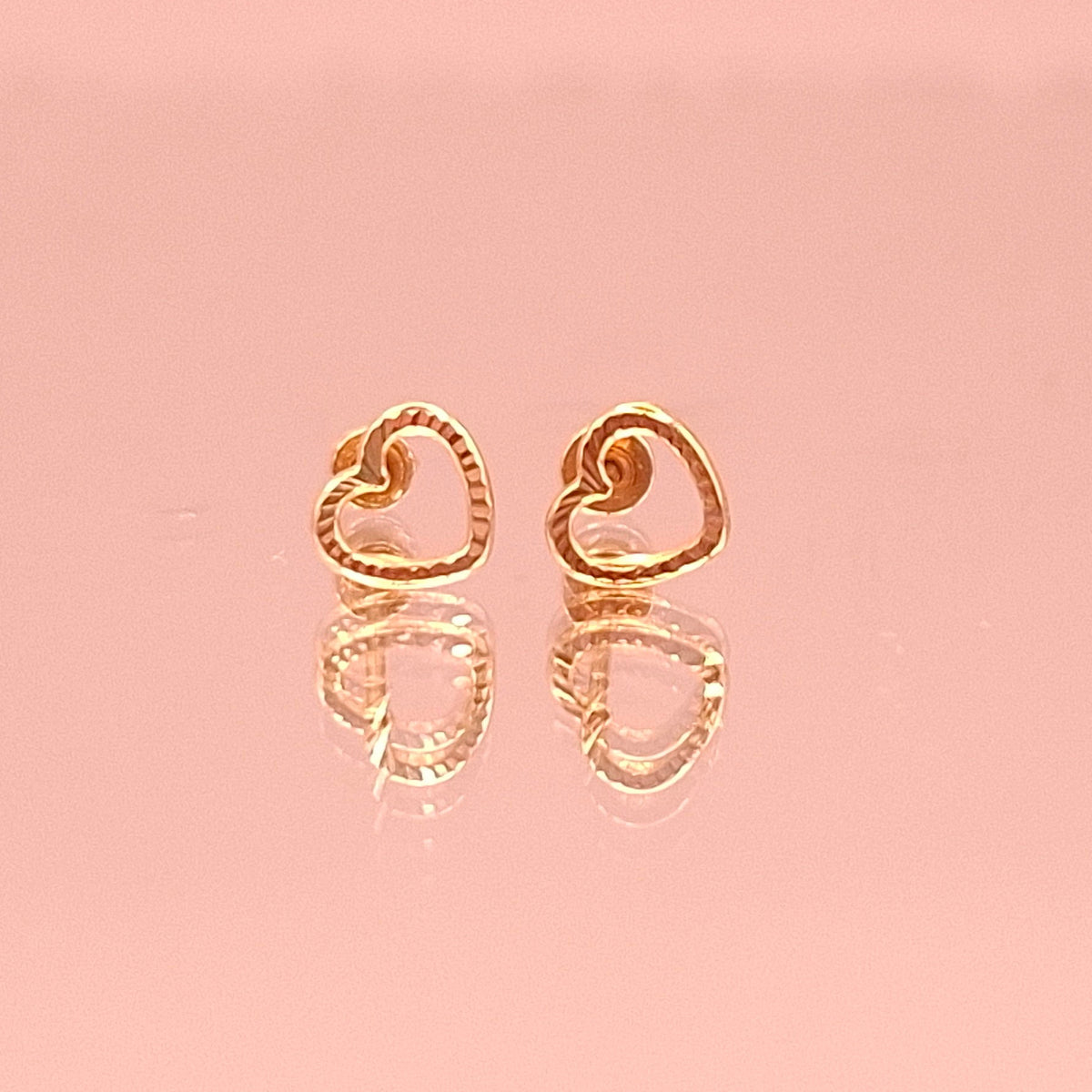 Aretes Bisel Corazón en Oro 10k