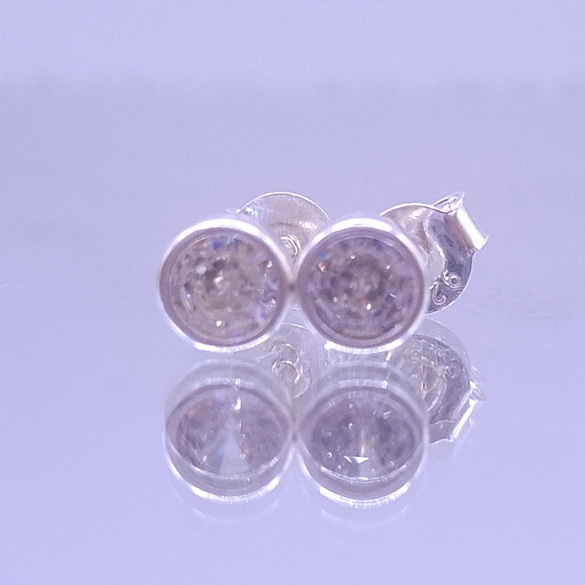 Aretes Sol CZ  Plata
